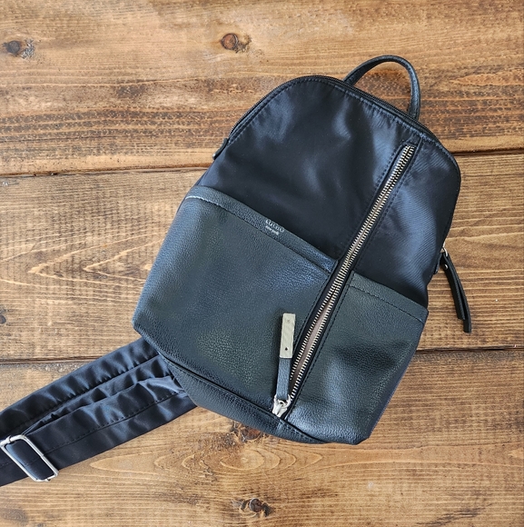 Tutilo Handbags - Tutilo New York Faux Leather & Nylon Black Sling Backpack